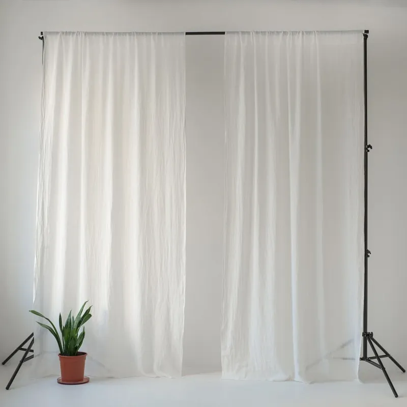 Biała lekka lniana zasłona z przeszyciem tunelowym Linen Tales Daytime, 250 x 130 cm Bonami Do wyczerpania zapasów