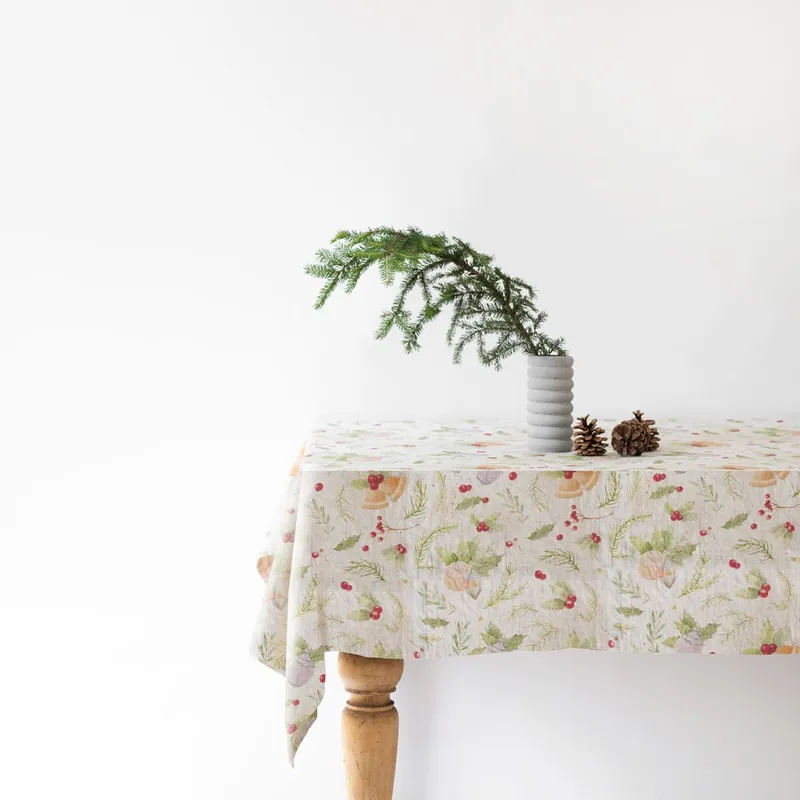 Świąteczny lniany obrus Linen Tales Jingle Bells, 140x140 cm Bonami Bezpieczna płatność