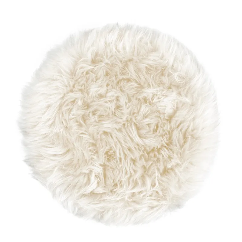 Białe siedzisko na krzesło z owczej skóry Royal Dream Zealand Round, ⌀ 35 cm Bonami Kup teraz